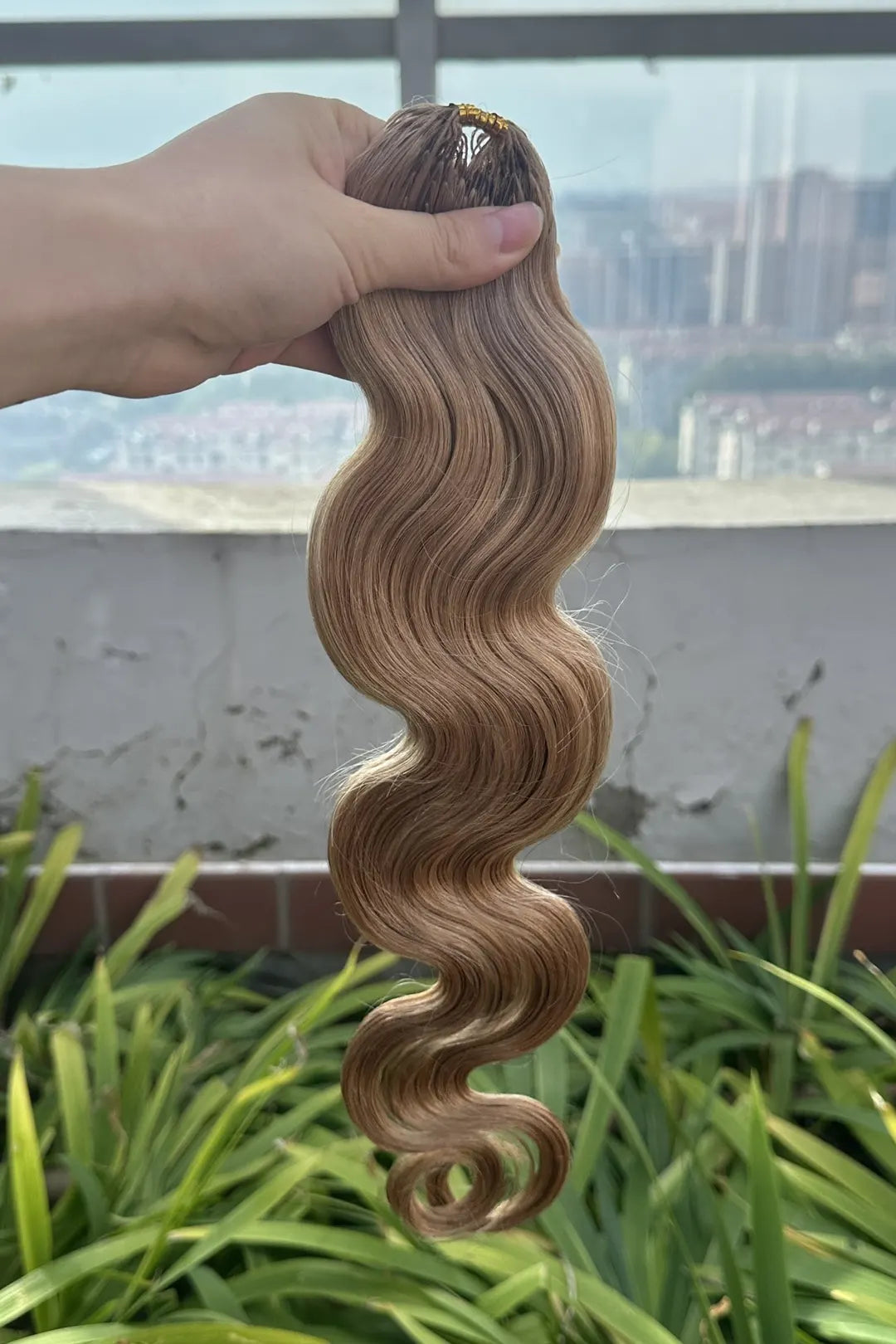 Outdoor picture of strawberry blonde 27 body wave feather crochet human hair 60g