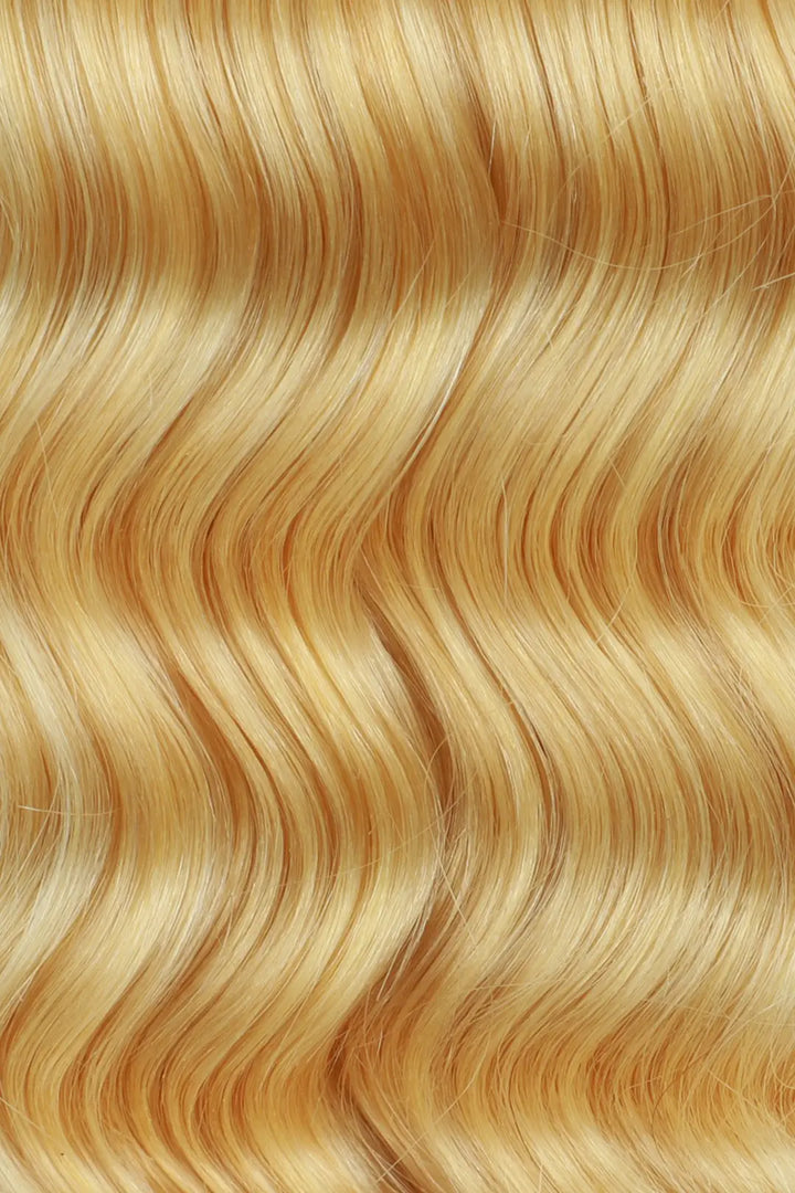 close-up of 613 blonde loose wave human hair texture
