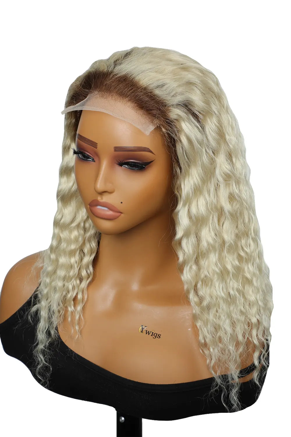 Side view of model with short blonde wavy hair