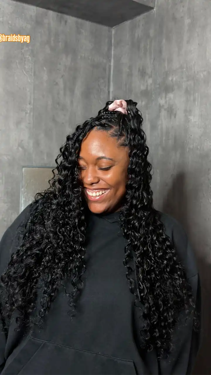 Woman with styled hair in a bathroom setting