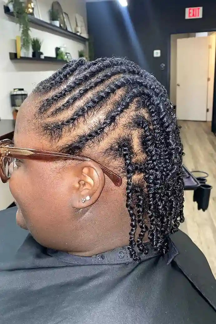 Person with styled hair in a salon setting