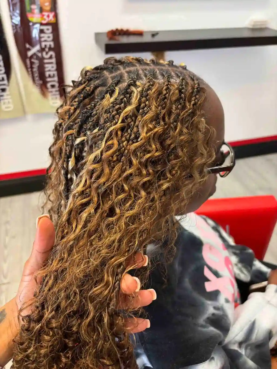 Person with styled hair in a salon setting