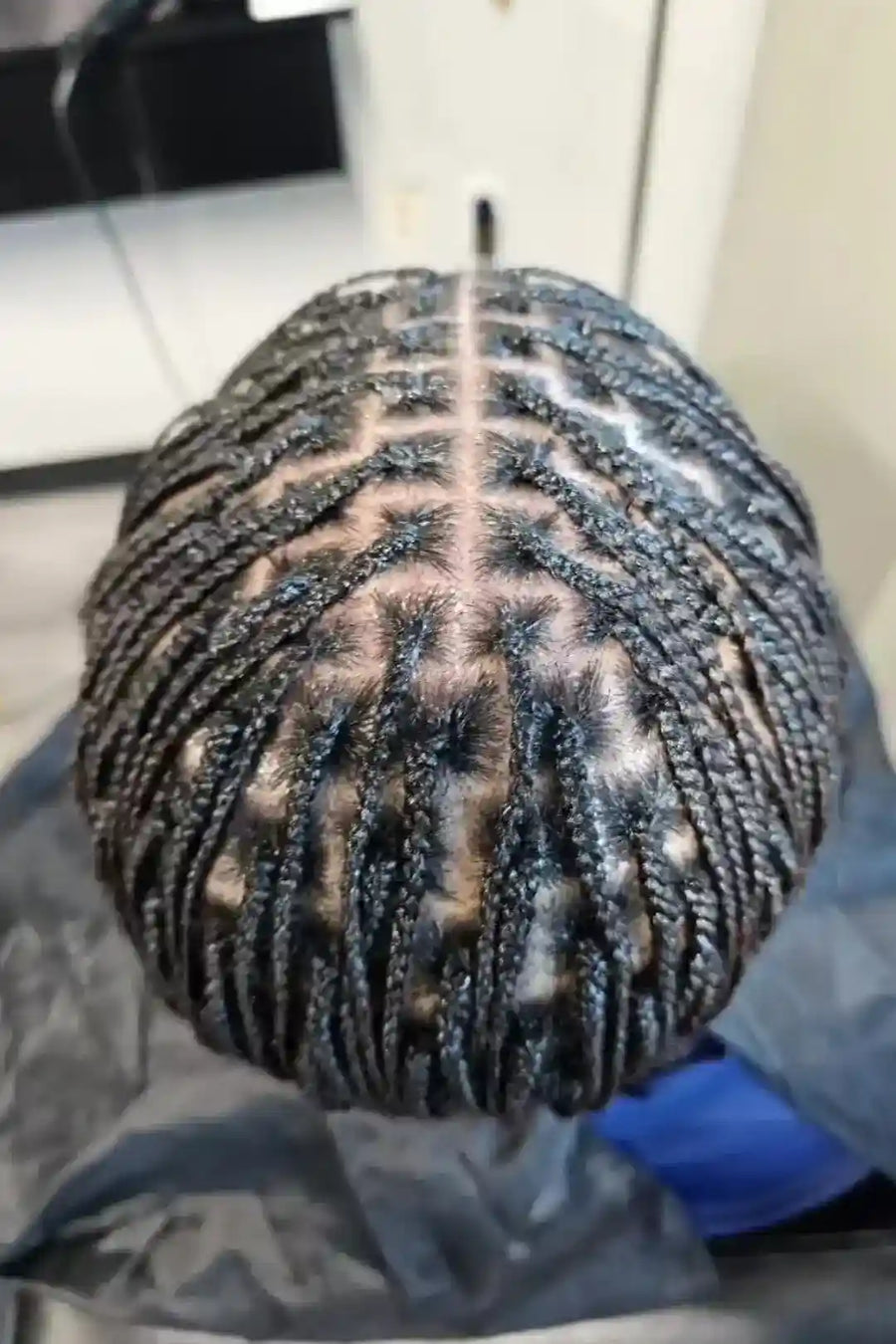 Mannequin head with textured surface and visible hairline