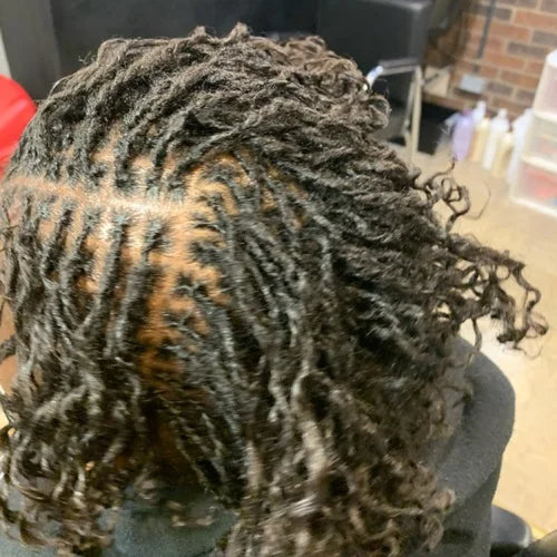 Close-up of a person with styled hair in a salon setting