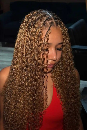 Tiktok influencer magicaltouchhair shows the braiding process of 27/30 mixed color water deep wave feather crochet human hair