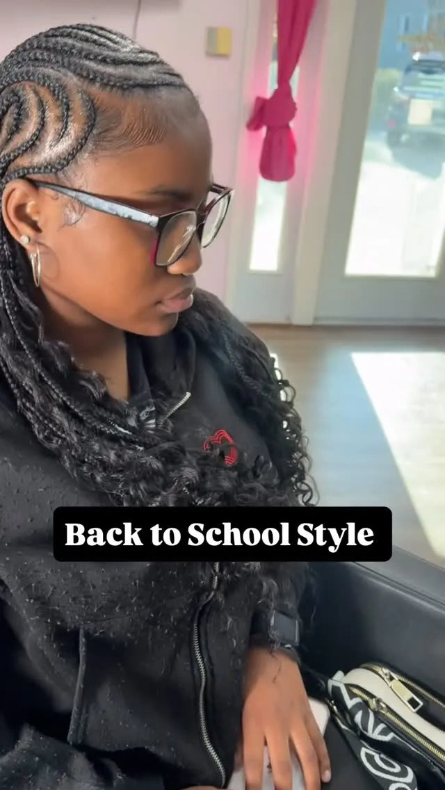Side feed-in cornrows with curly braided ends for a back-to-school hairstyle, hairstylist located in Augusta, GA