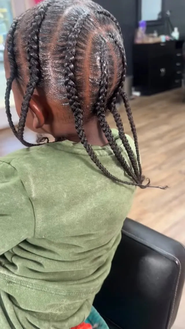 Kids cornrow braids with simple straight-back sections and neat parting, hairstylist located in Augusta, GA