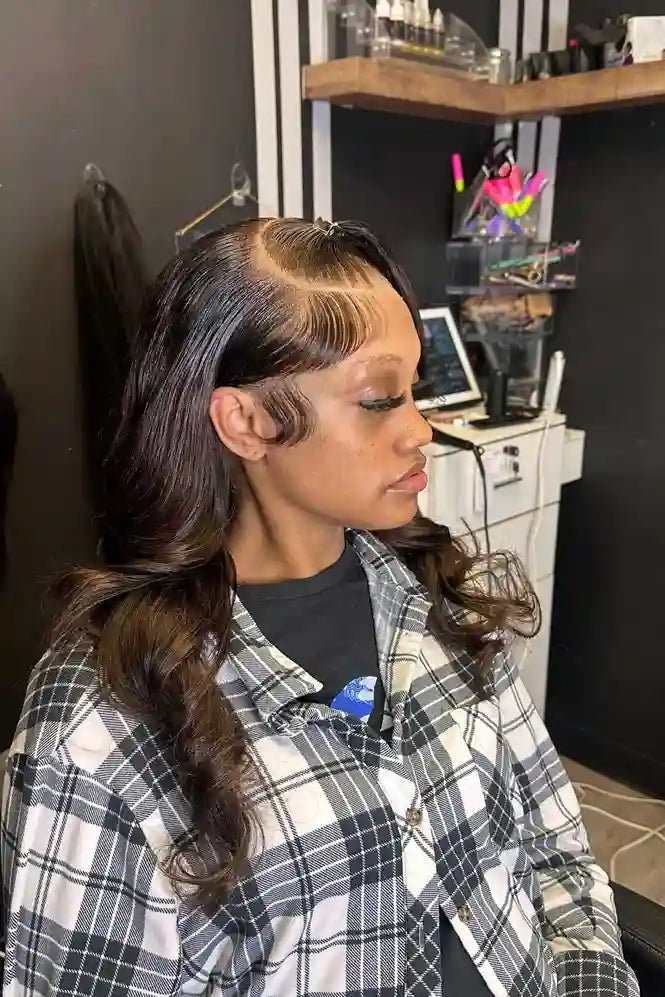 Person with styled hair in a salon setting