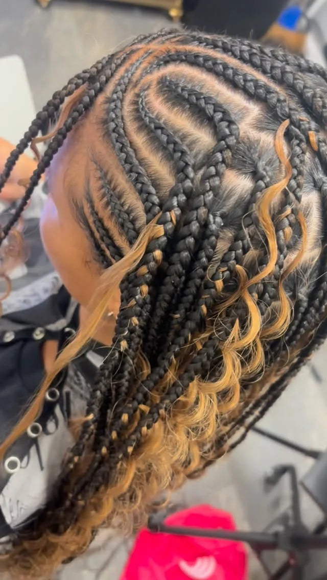 Close-up of braided hair with a blurred background