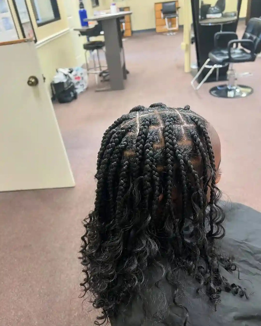 Person with styled hair in a salon setting