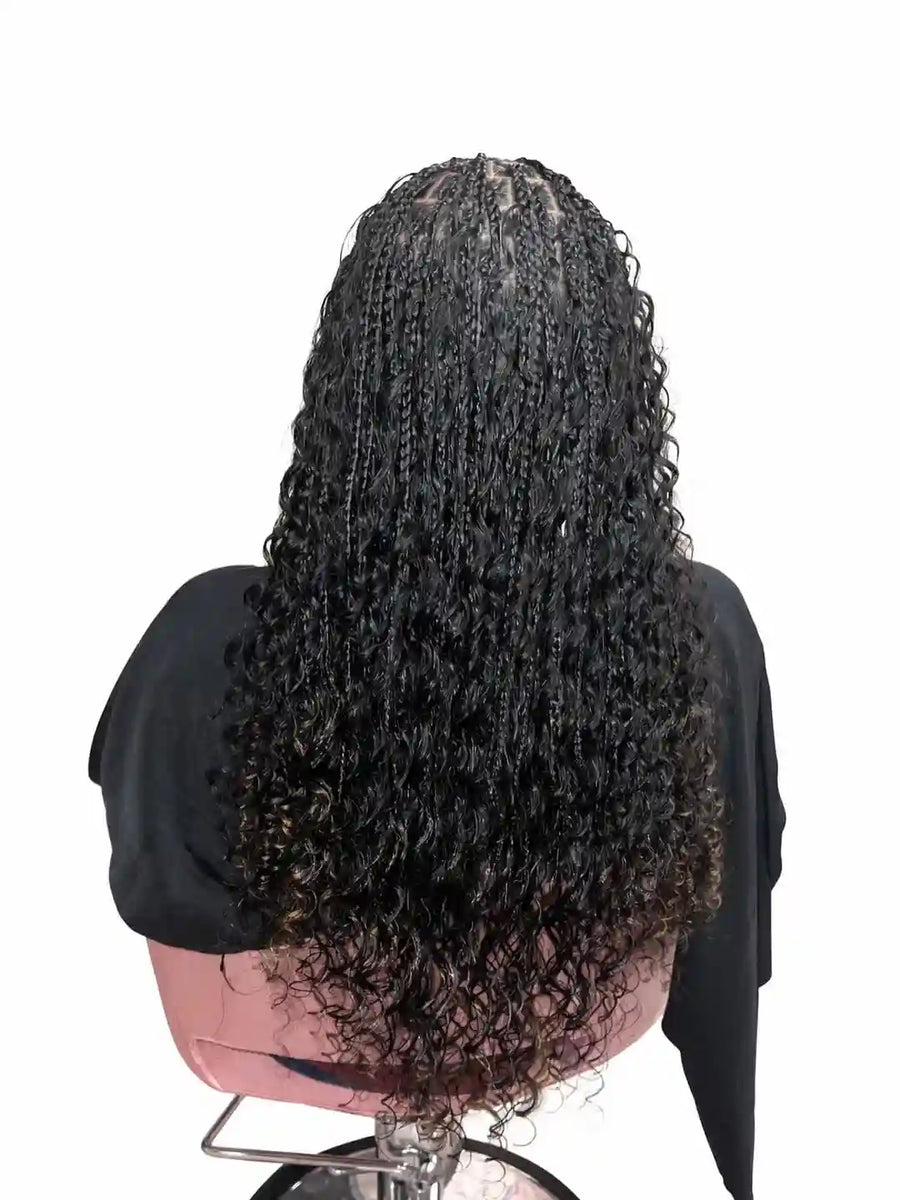 Mannequin head with a wig on a white background