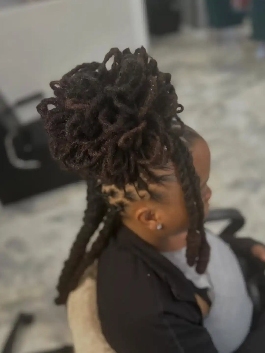 Person with styled hair in a salon setting
