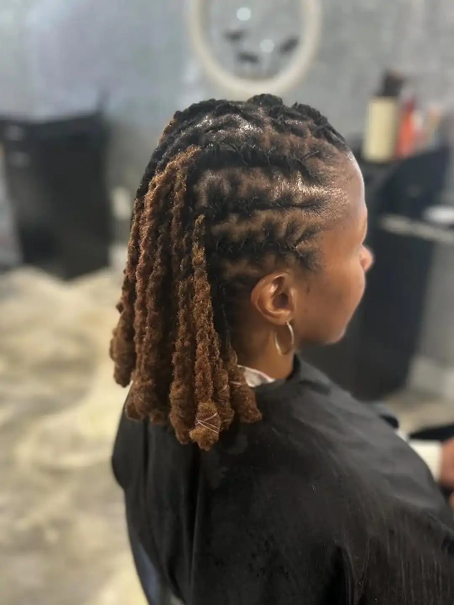 Person with styled hair in a salon setting