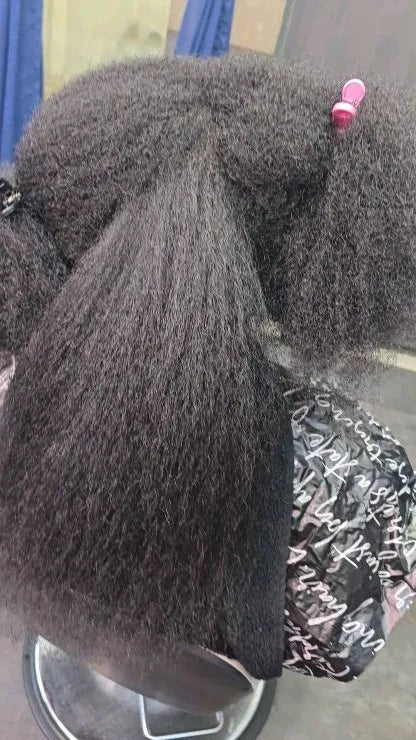 Natural textured hair sectioned for braid preparation, Stylist located in Atlanta, GA