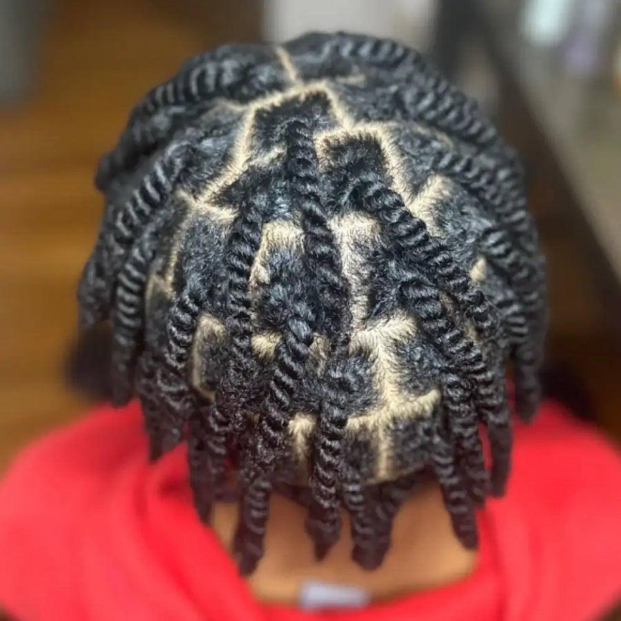 Close-up of braided hair with a blurred background