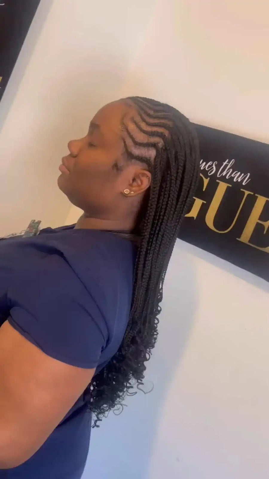 Woman with styled hair against a blurred background