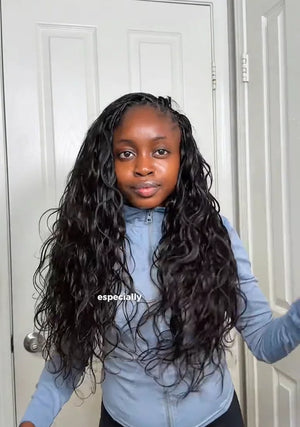 Tiktok influencer Abi_s_World_ shows the braiding process of body wave feather crochet hair extension