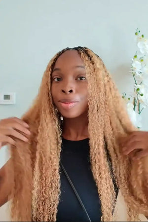 Tiktok influencer dyme galore shows the braiding process of 27/30 mixed color burmese curly with spiral curls crochet miracle knots hair