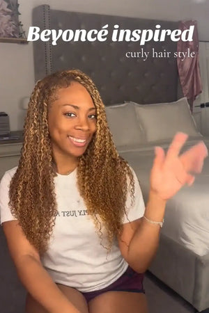 Tiktok influencer robeon davis shows the braiding process of 27/30 mixed color water deep wave feather crochet human hair