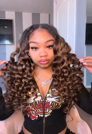 Tiktok influencer YT_MY_ASIA_DESIREE_ shows the braiding process of 4 27 30 piano color hair bundles deep wave