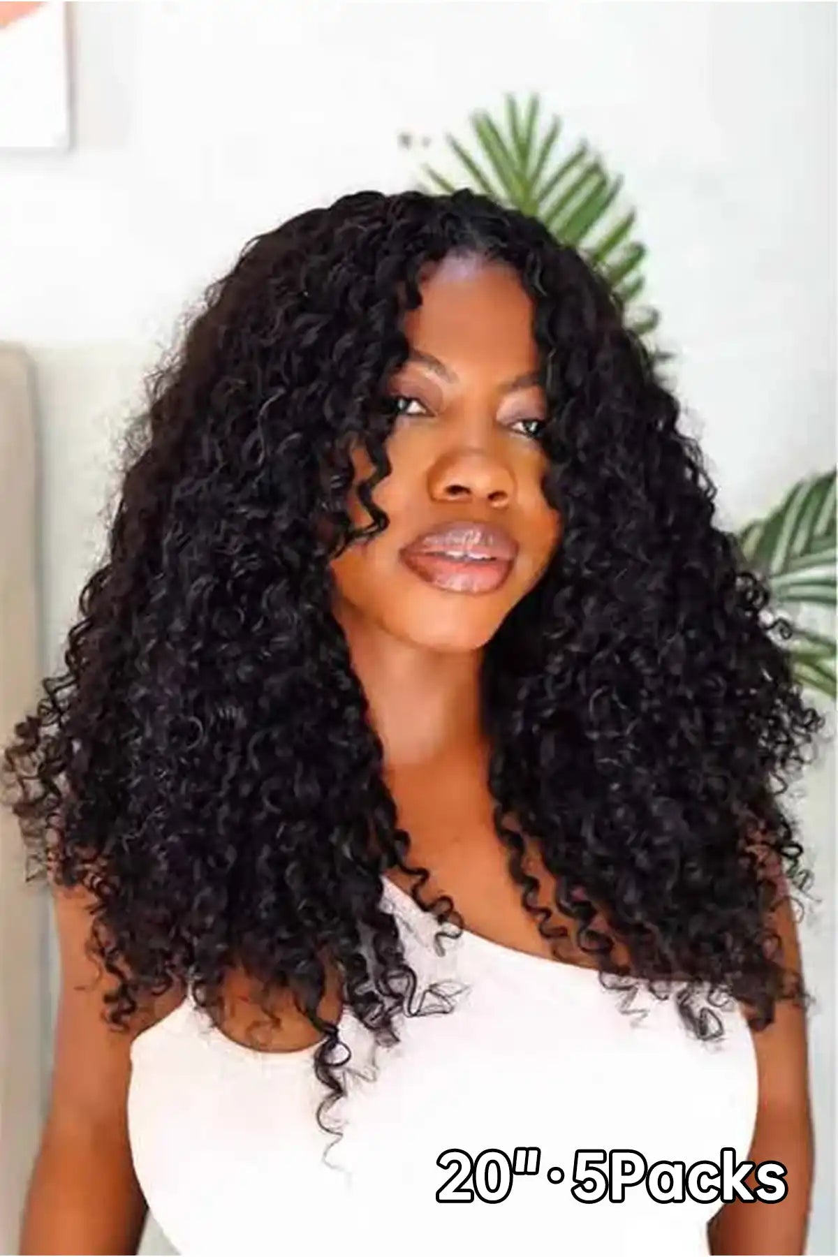 Tiktok influencer iam_ngozi  shows the braiding process of water wave feather crochet hair extension