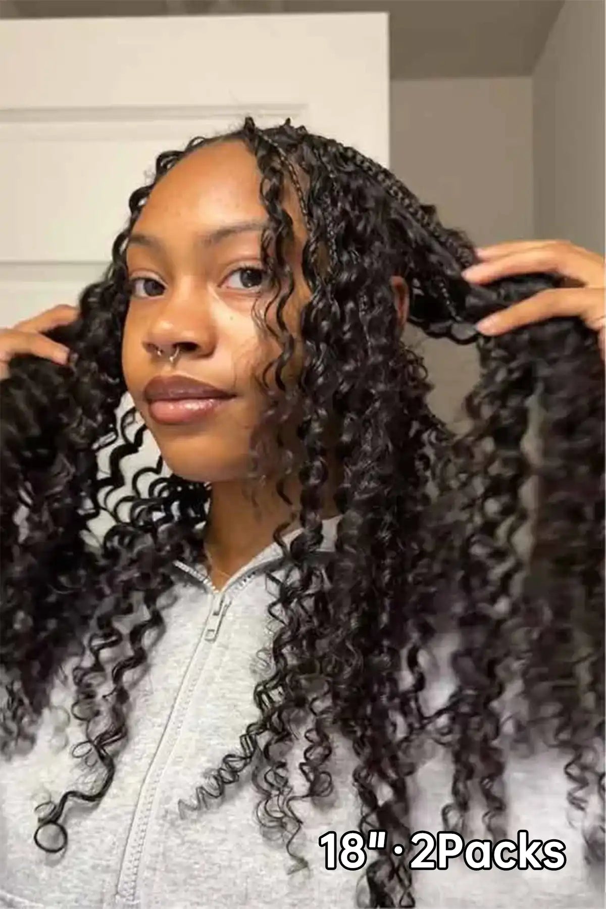 Tiktok influencer jairesemaj shows the braiding process of burmese curly with spiral ends feather crochet hair 