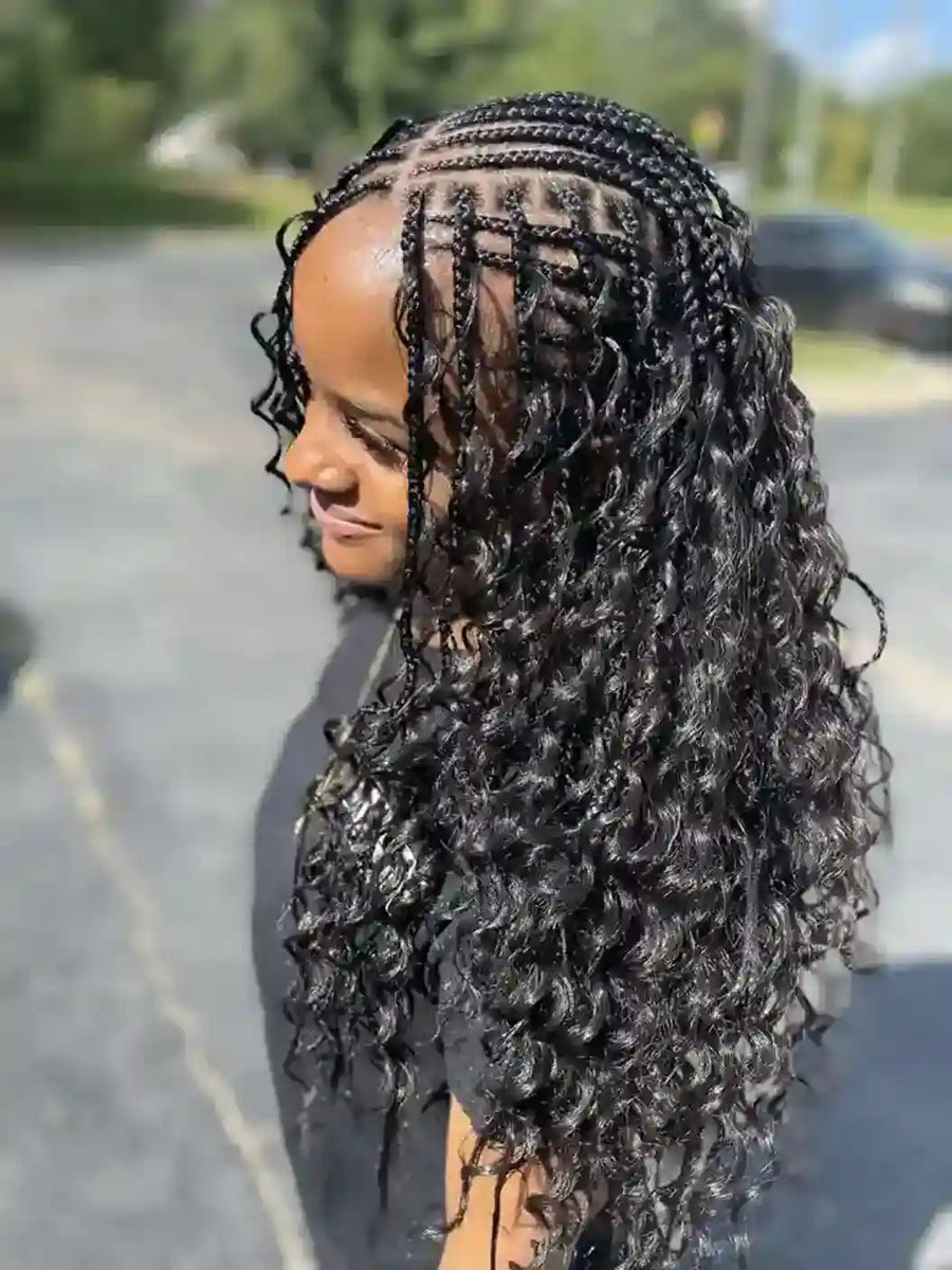Person with styled hair in a parking lot
