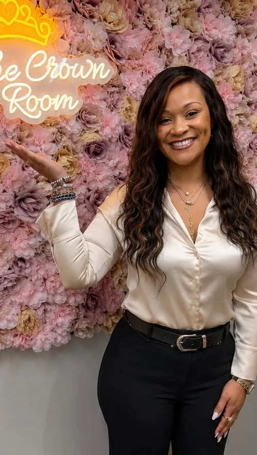 Long body wave extensions hairstyle with middle part, hairstylist in Louis, MO