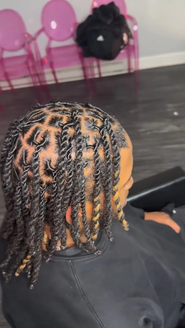 Boho knotless braids with curly ends and neat square parts, Stylist located in Philadelphia, PA