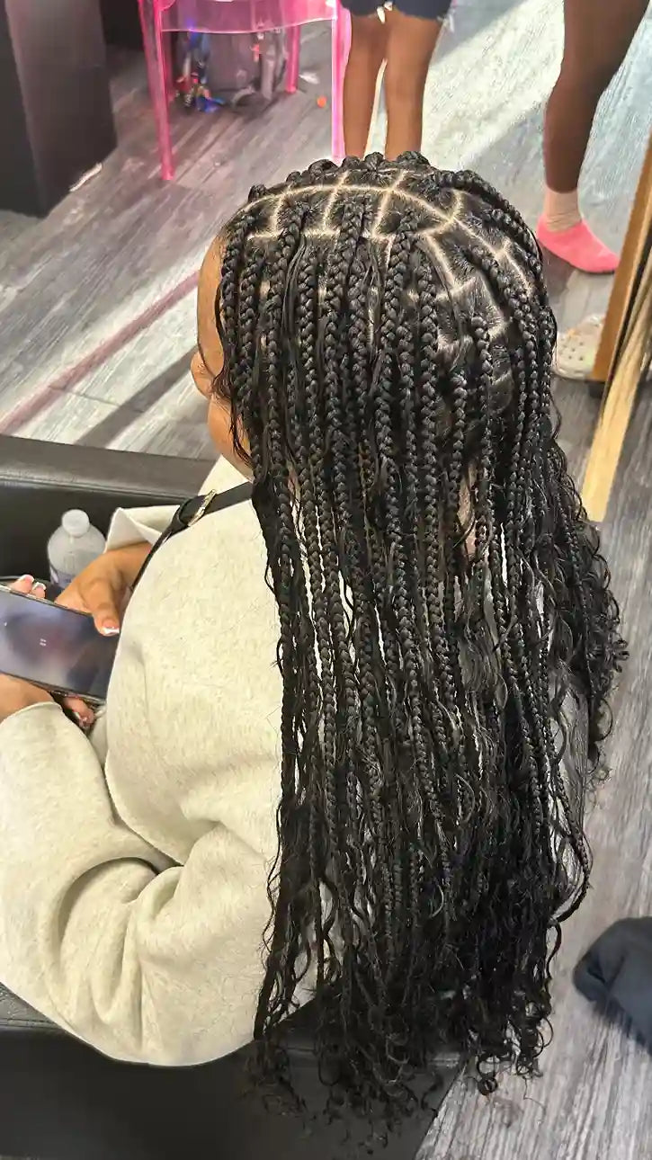 1. Boho box braids with loose curly ends, Stylist located in Philadelphia, PA