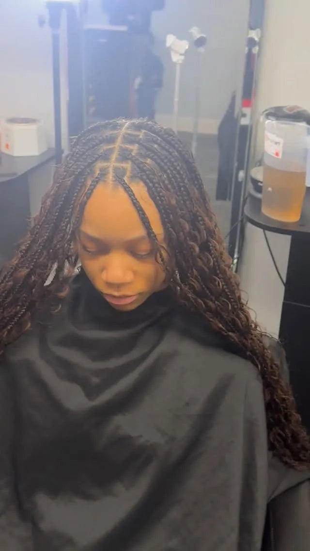 Small boho knotless braids with loose curly texture, Stylist located in Philadelphia, PA