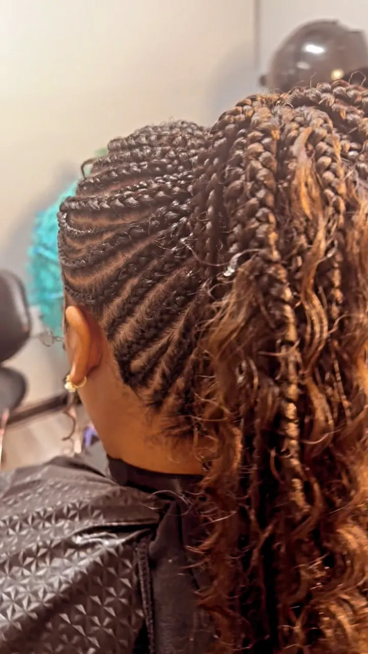 Feed-in cornrow braids styled into a high ponytail with honey brown curly extensions, Stylist located in Greensboro, NC
