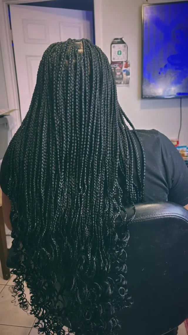 Long black box braids with curled ends and a full protective style, hairstylist located in Hueytown, AL