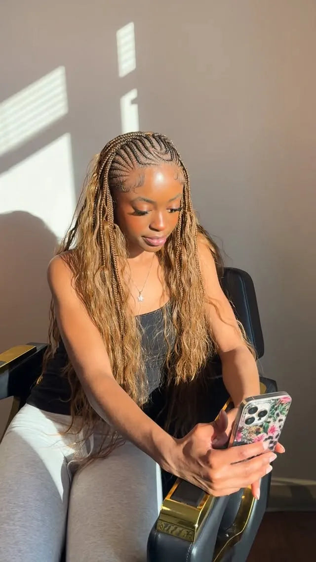 Blonde boho knotless braids with loose wavy pieces and scalp braid design, hairstylist in Sicklerville, NJ