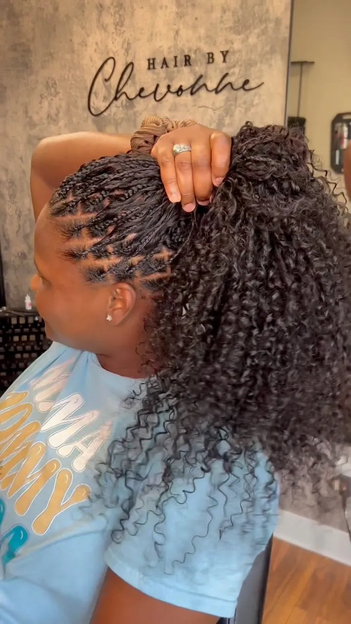 Natural black afro hair with a full, fluffy texture before protective styling, Stylist located in Houston, TX
