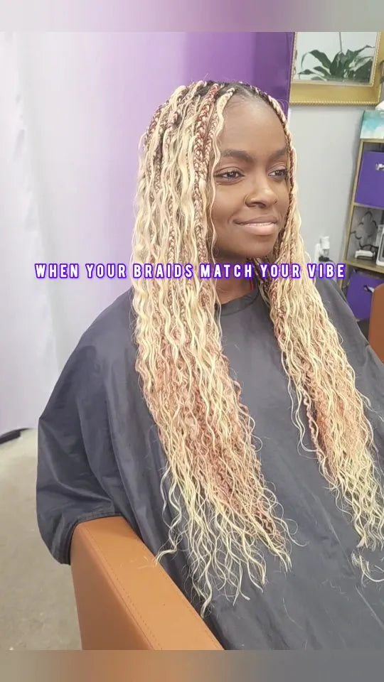 Blonde boho braids with loose wavy strands and waist-length finish, hairstylist located in Morrisville, North Carolina