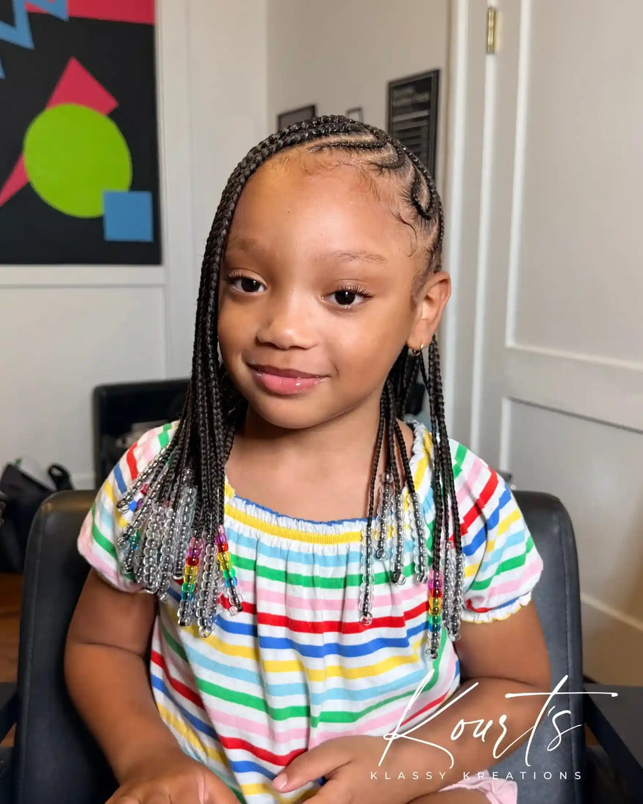 Kids side-part braids with beads and colorful accents, hairstylist in Thomasville, GA