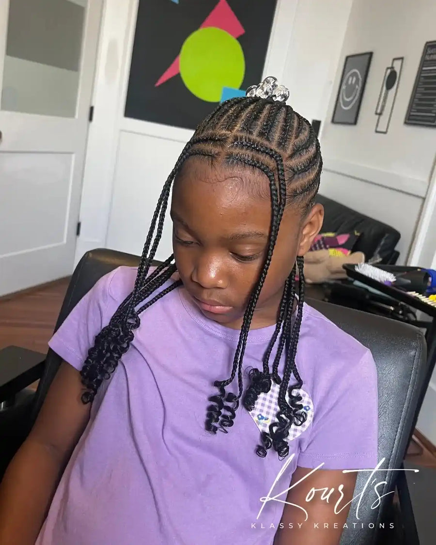Long boho knotless braids with curly human hair pieces, hairstylist in Thomasville, GA