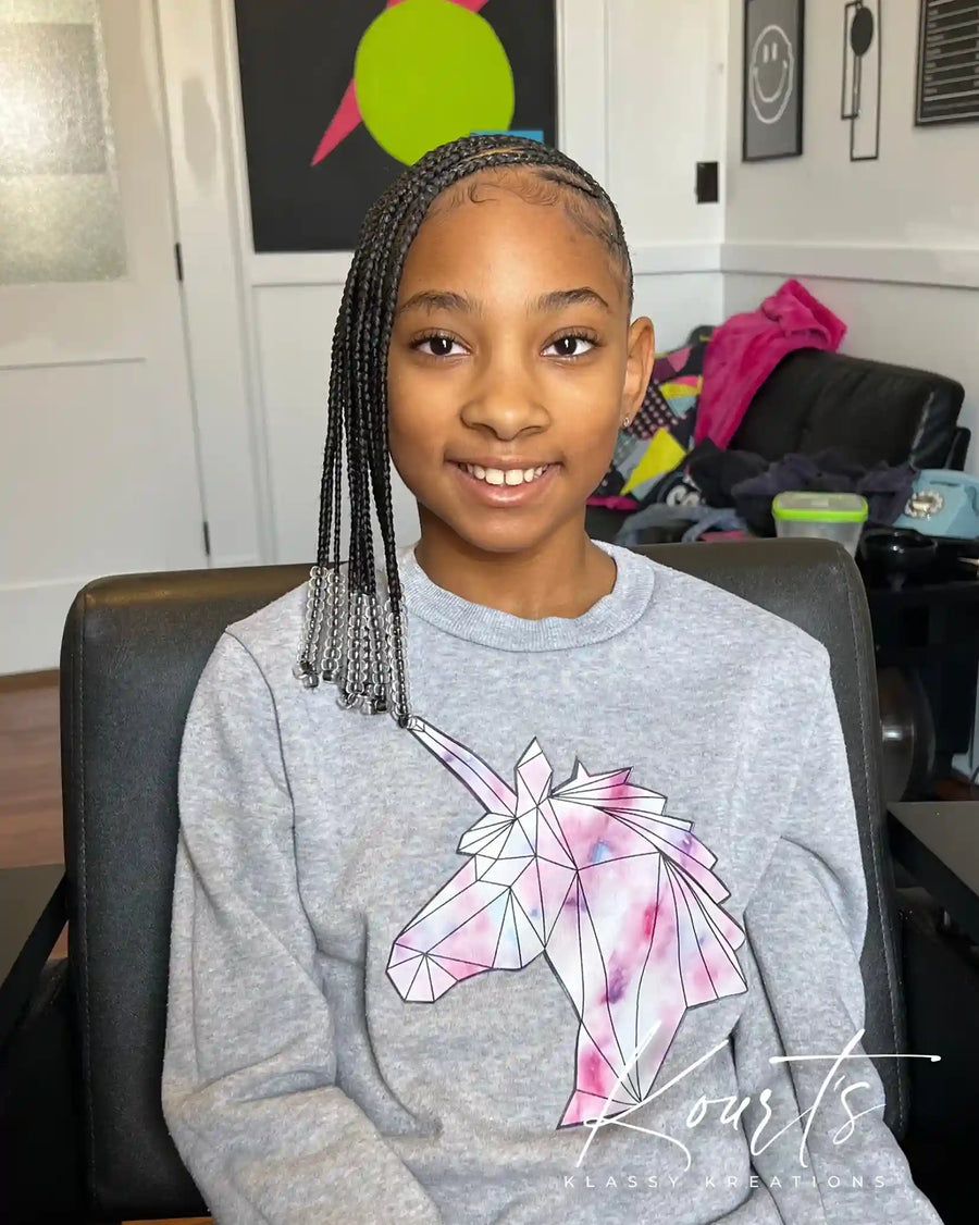 Kids braided ponytail with curl ends and clean parts, hairstylist in Thomasville, GA