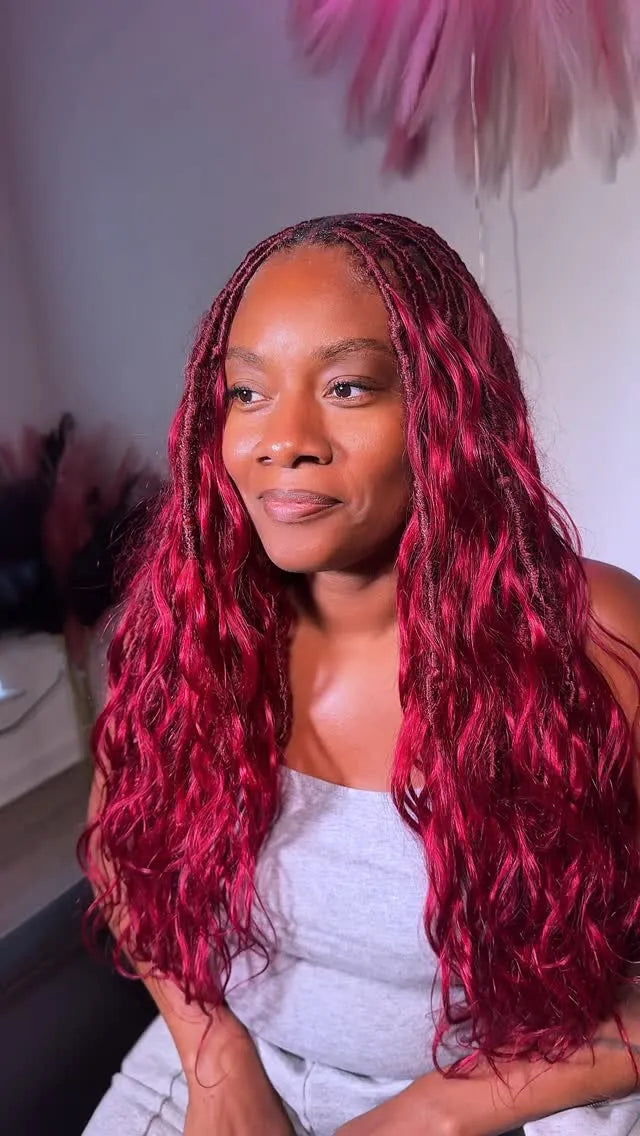 Burgundy boho knotless braids with loose waves, hairstylist in Brookhaven, GA