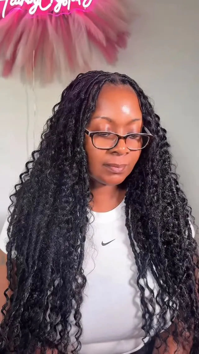 Extra long black boho knotless braids with voluminous curls, hairstylist in Brookhaven, GA