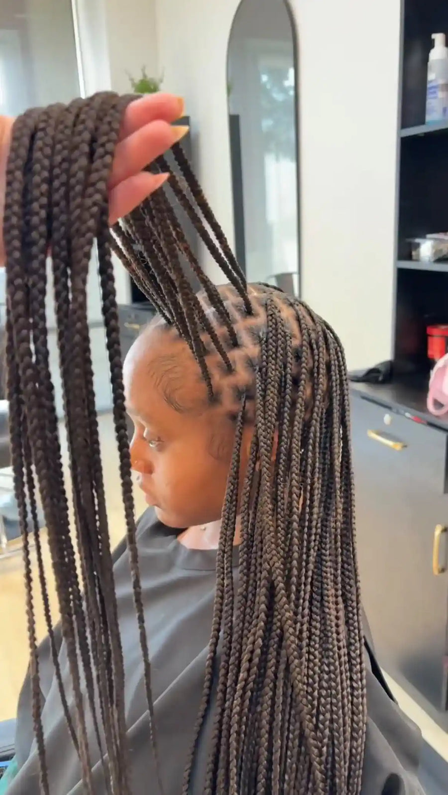 Kids small box braids with neat square parting, hairstylist in Houston, TX