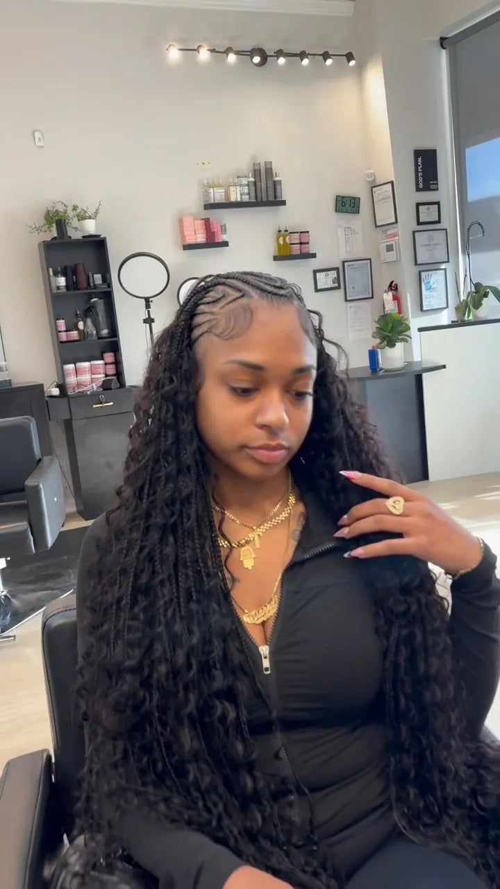 Long curly boho braids with side cornrow detail, hairstylist in Houston, TX