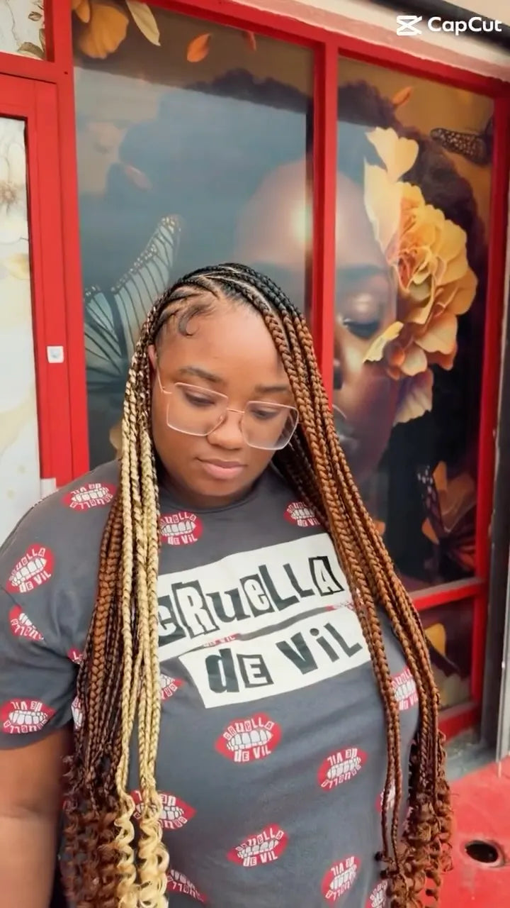 Long knotless braids with blonde and copper highlights and curled ends, Stylist located in Homestead, FL