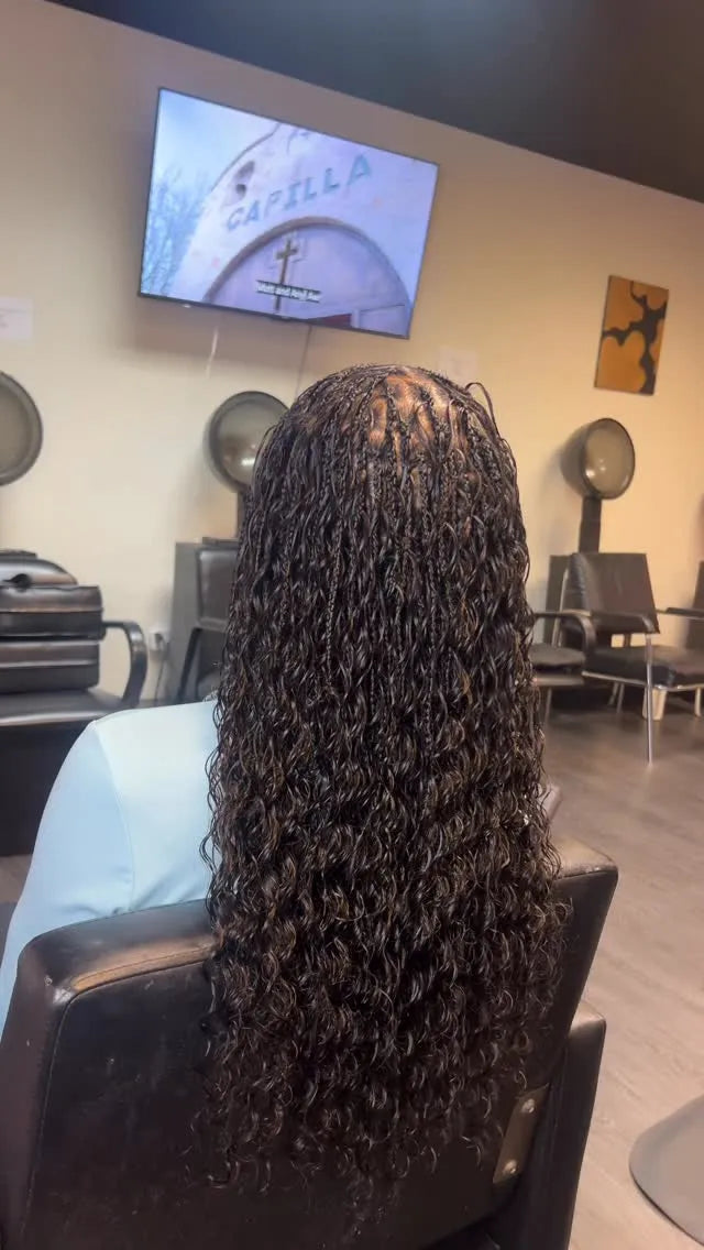 Long black boho braids with wet and wavy curls, Stylist located in Homestead, FL
