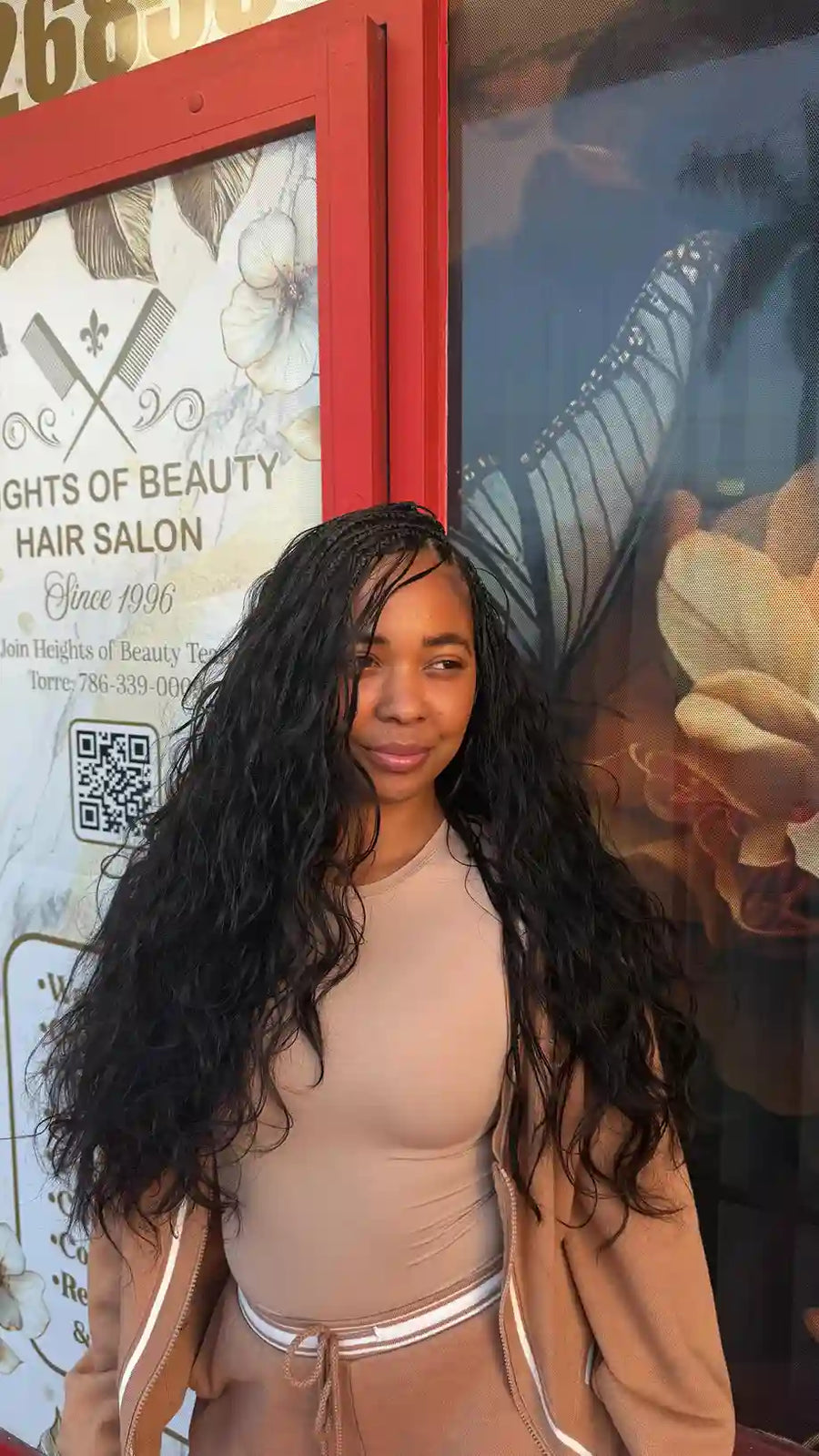 Long black wet and wavy hair extensions with natural volume, Stylist located in Homestead, FL