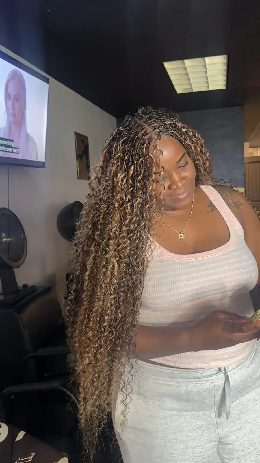 Long honey blonde boho braids with loose curly human hair, Stylist located in Homestead, FL