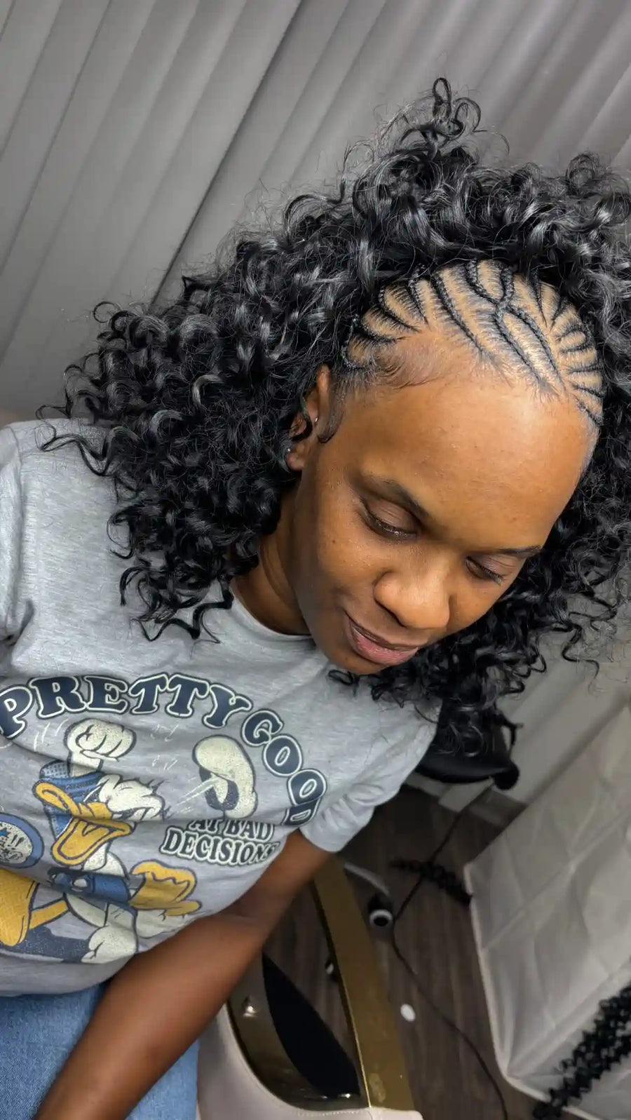 Half cornrow half curly hairstyle with defined curls, Stylist located in Smyrna, GA
