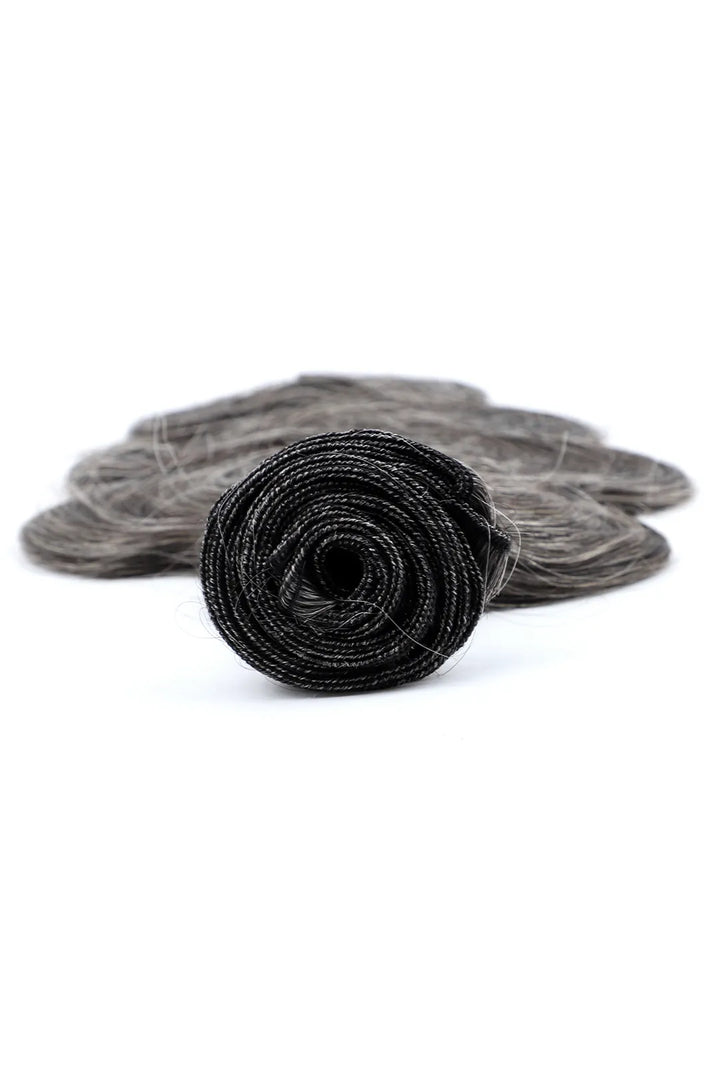 Detail of the ends of 100% natural grey hair salt and pepper brazilian hair bundles