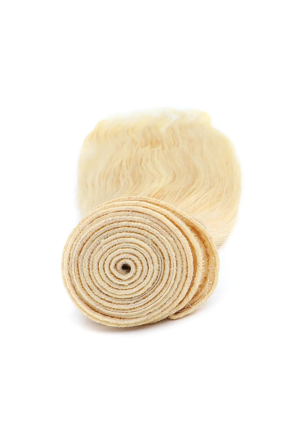 Detail of the ends of 613 blonde bundles double weft sew in extensions straight virgin hair 